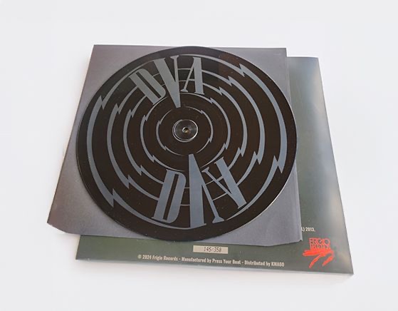Etched vinyl record displayed on a sleeve from a Press Your Beat project